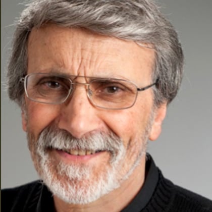 a person with glasses and a beard