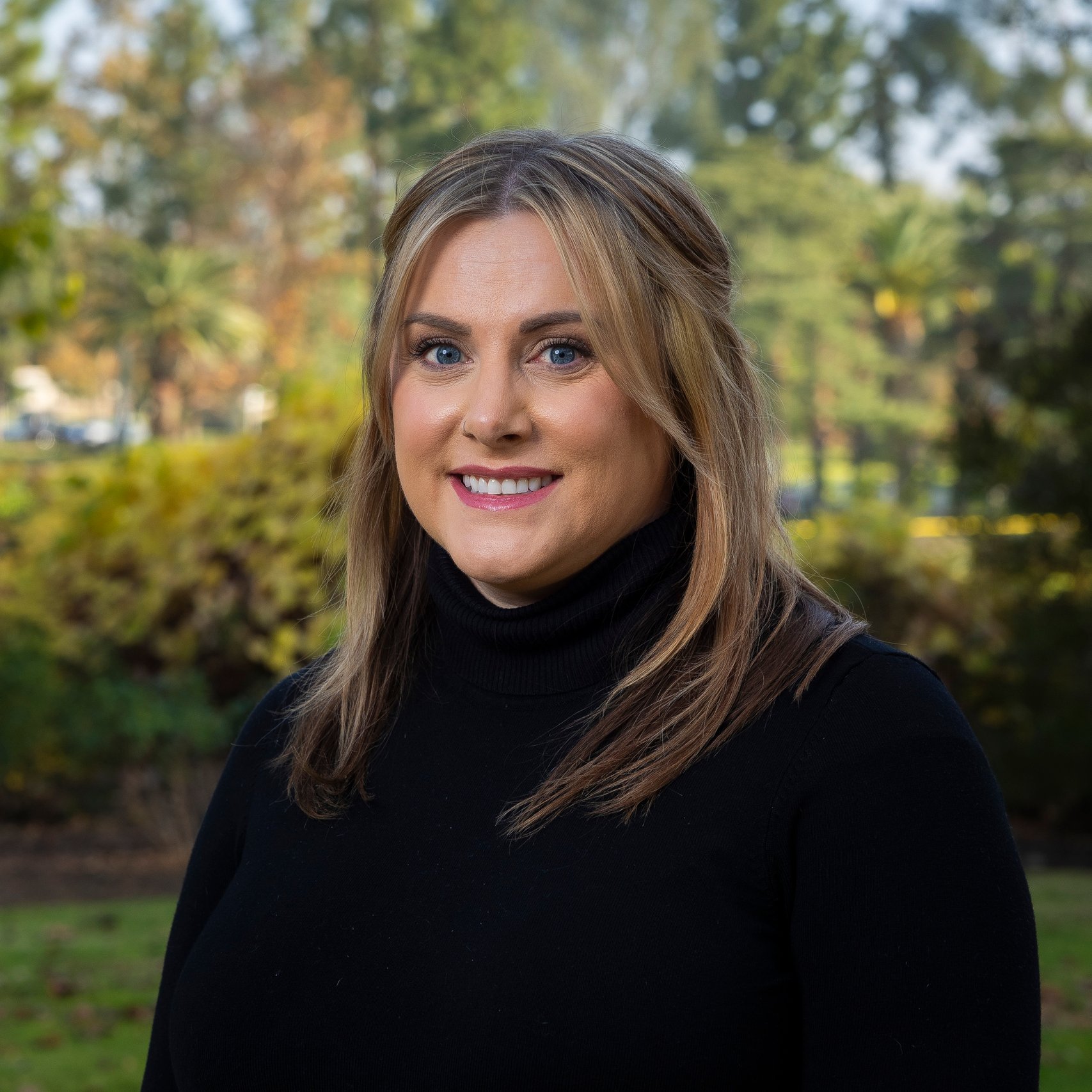 a person smiling at camera