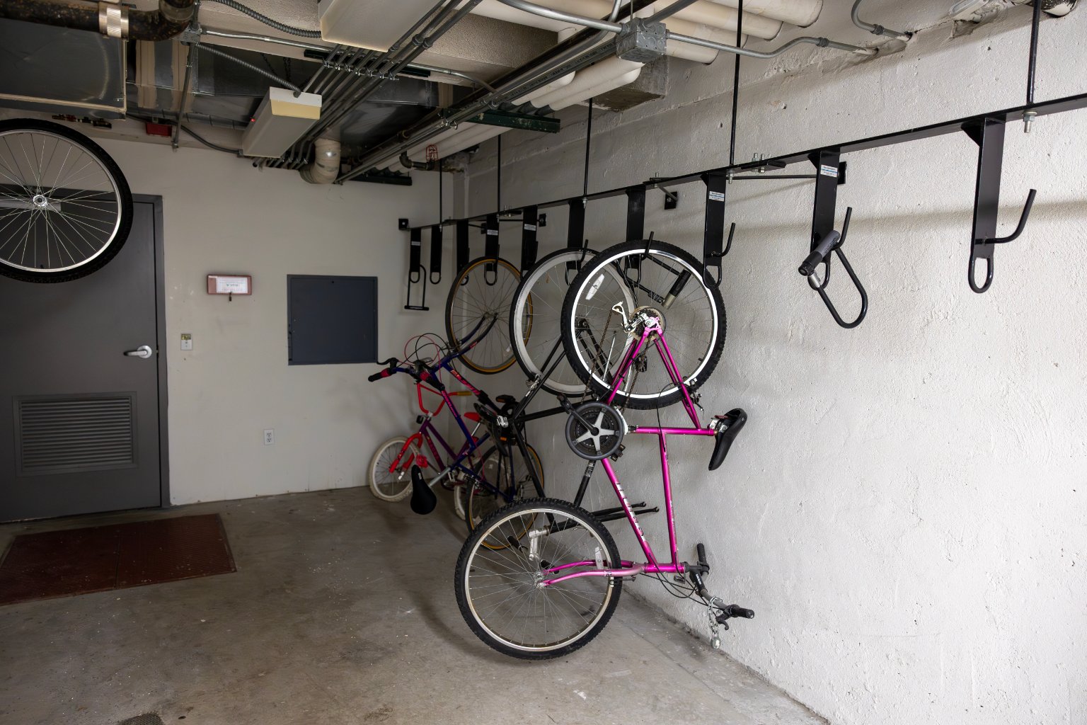 a group of bicycles on a wall