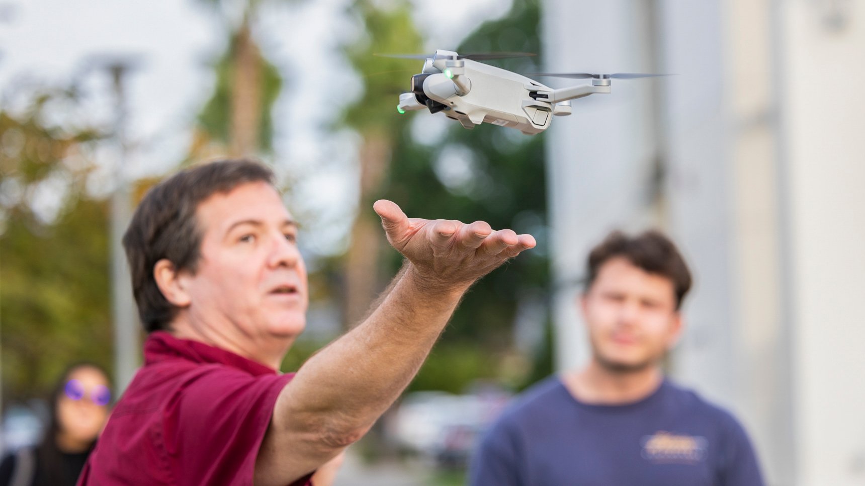 a man flying a drone