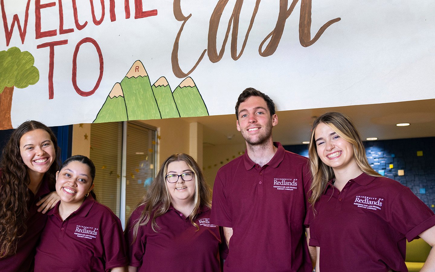 a group of people posing for a photo