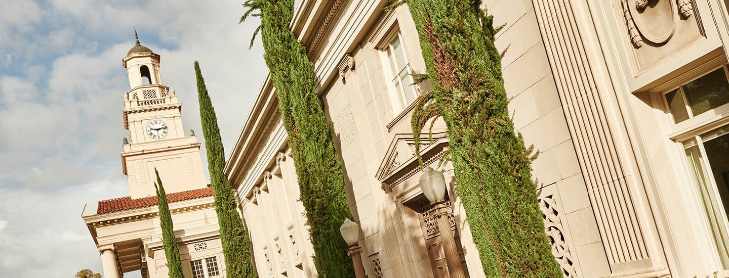 a building with trees on the side