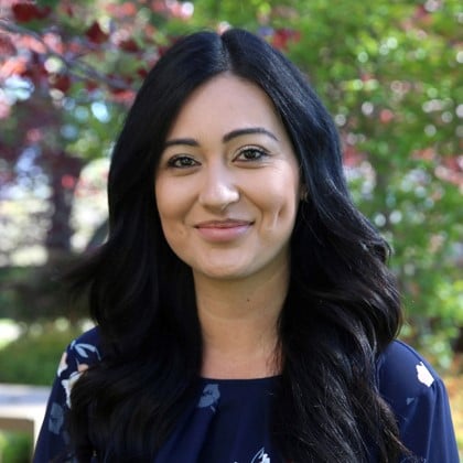 a person smiling at camera