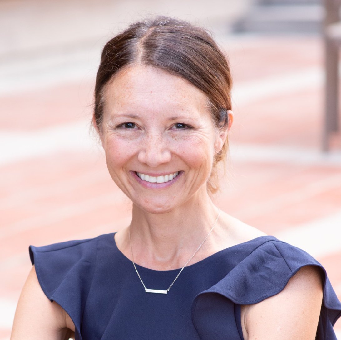 a person smiling at camera