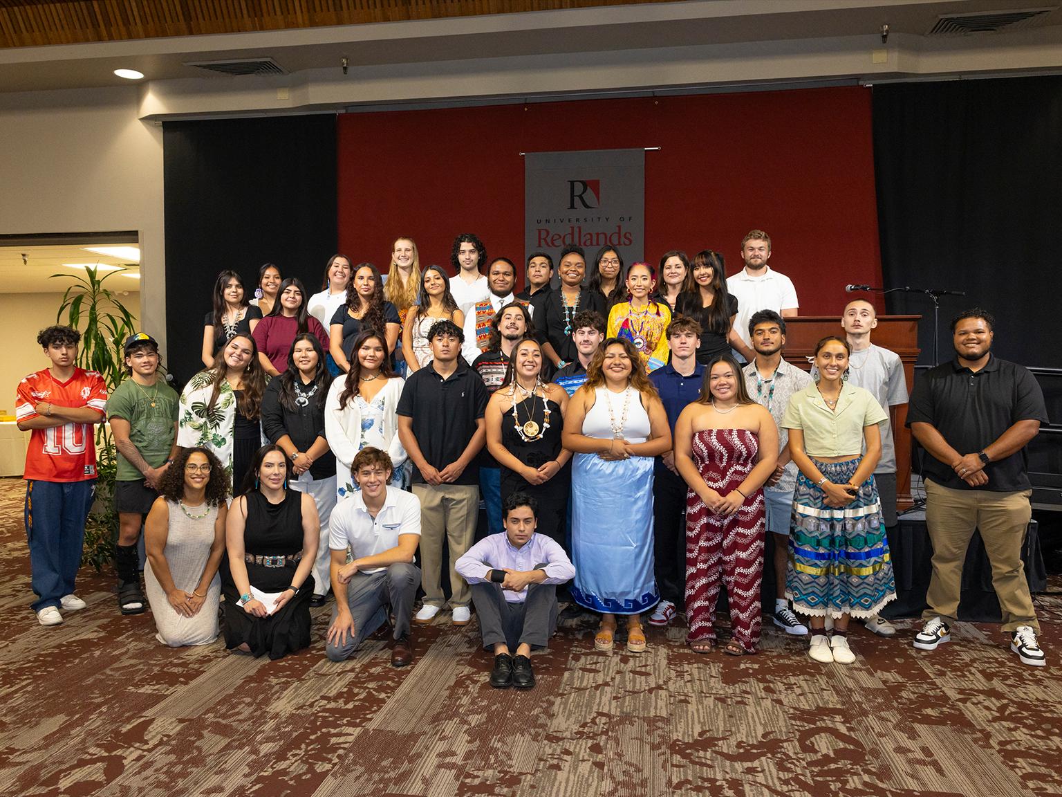 a group of people posing for a photo