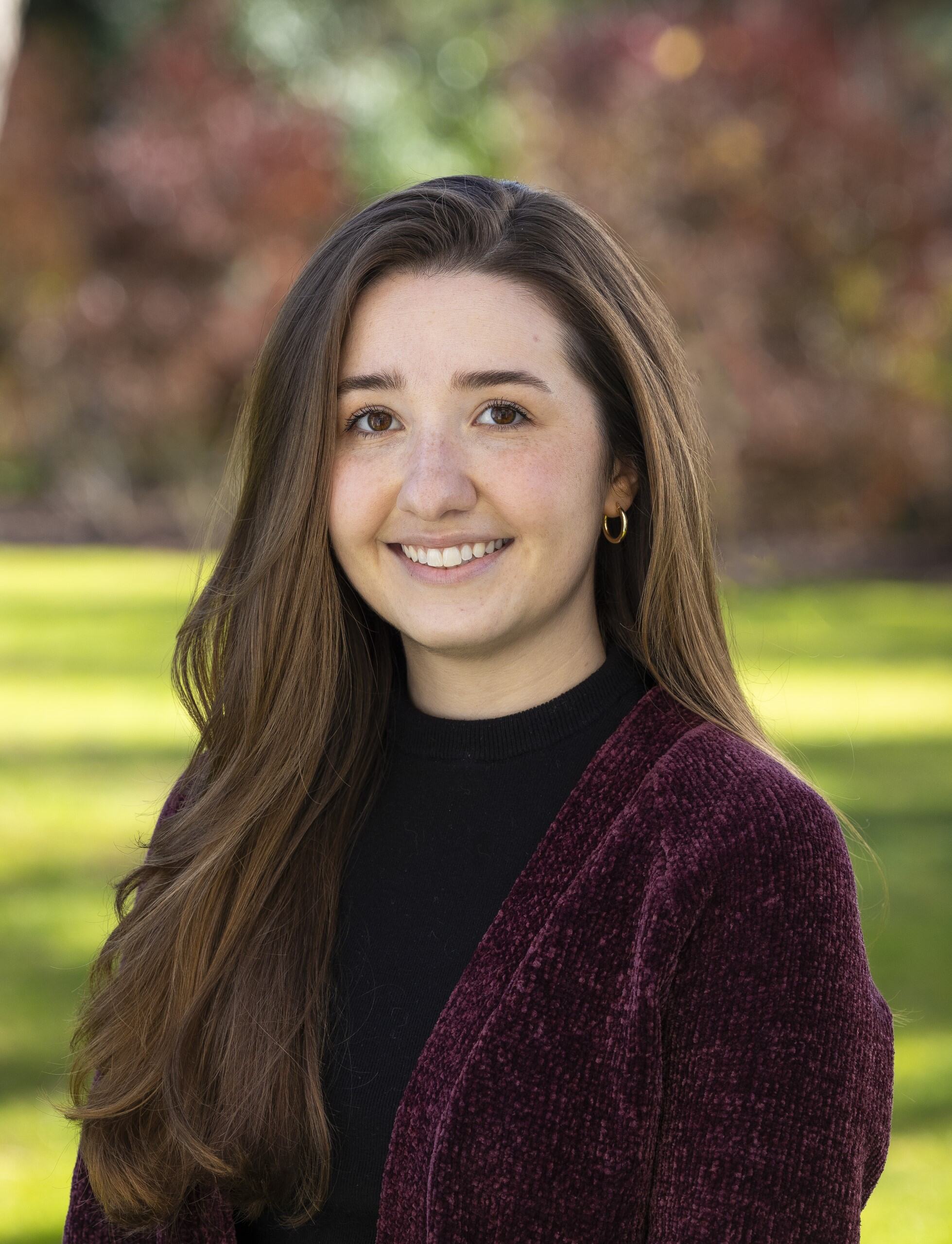 a woman smiling at camera