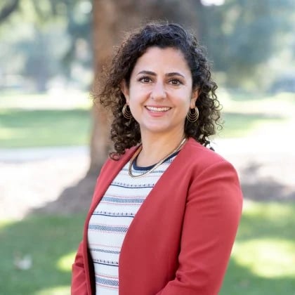 a woman smiling at camera