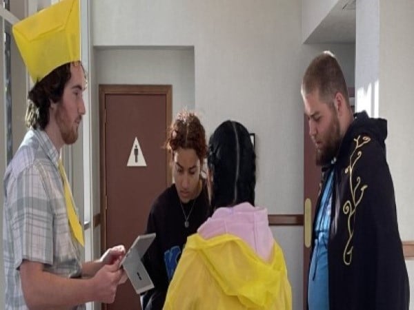a group of people in a hallway