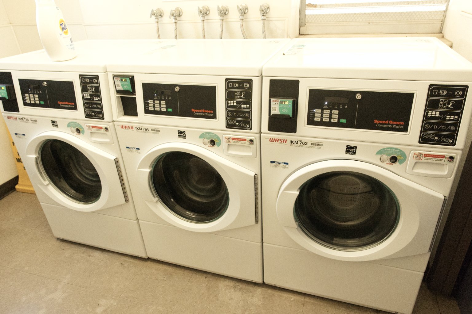 a group of white washing machines