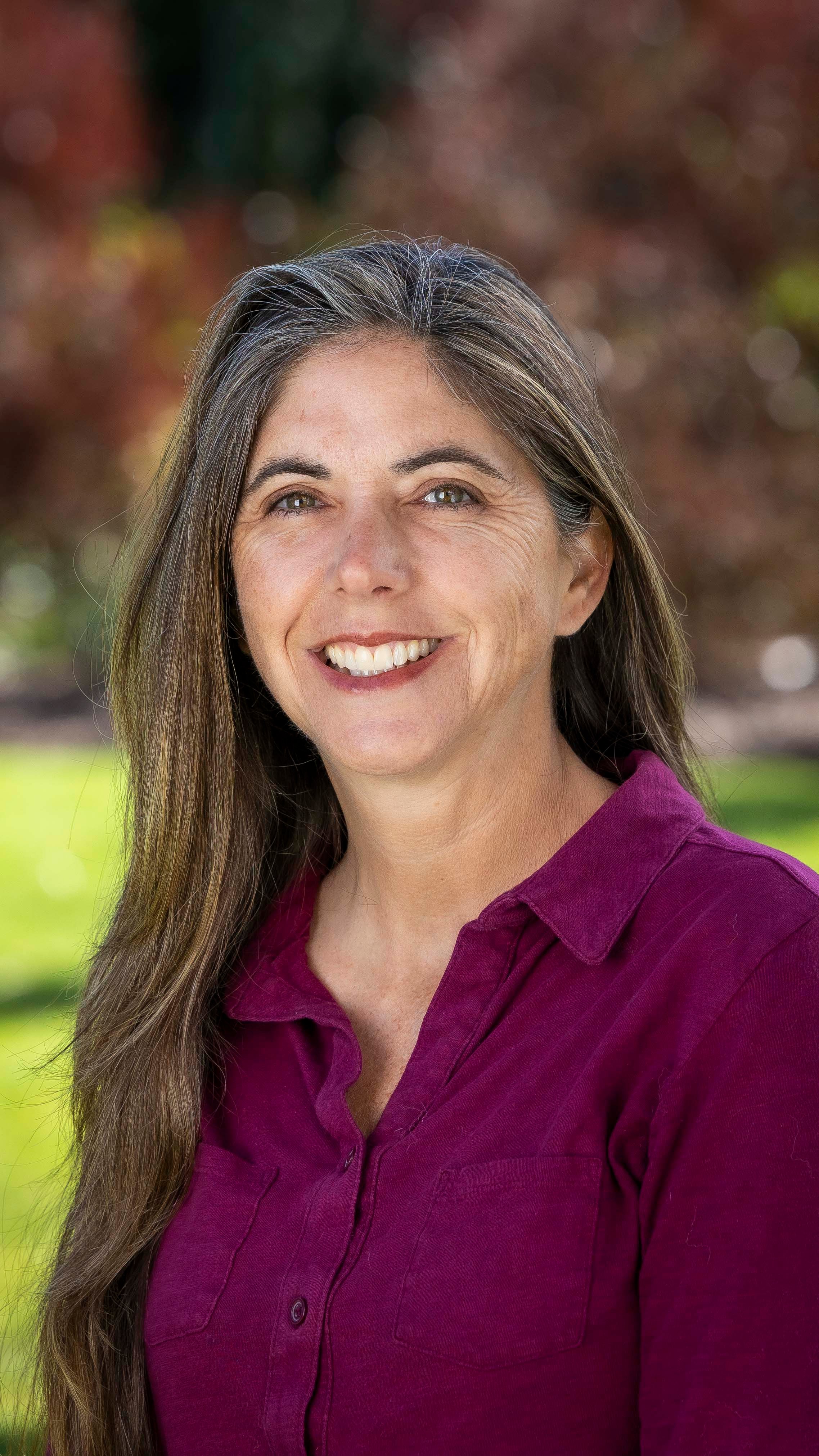 a person smiling at the camera