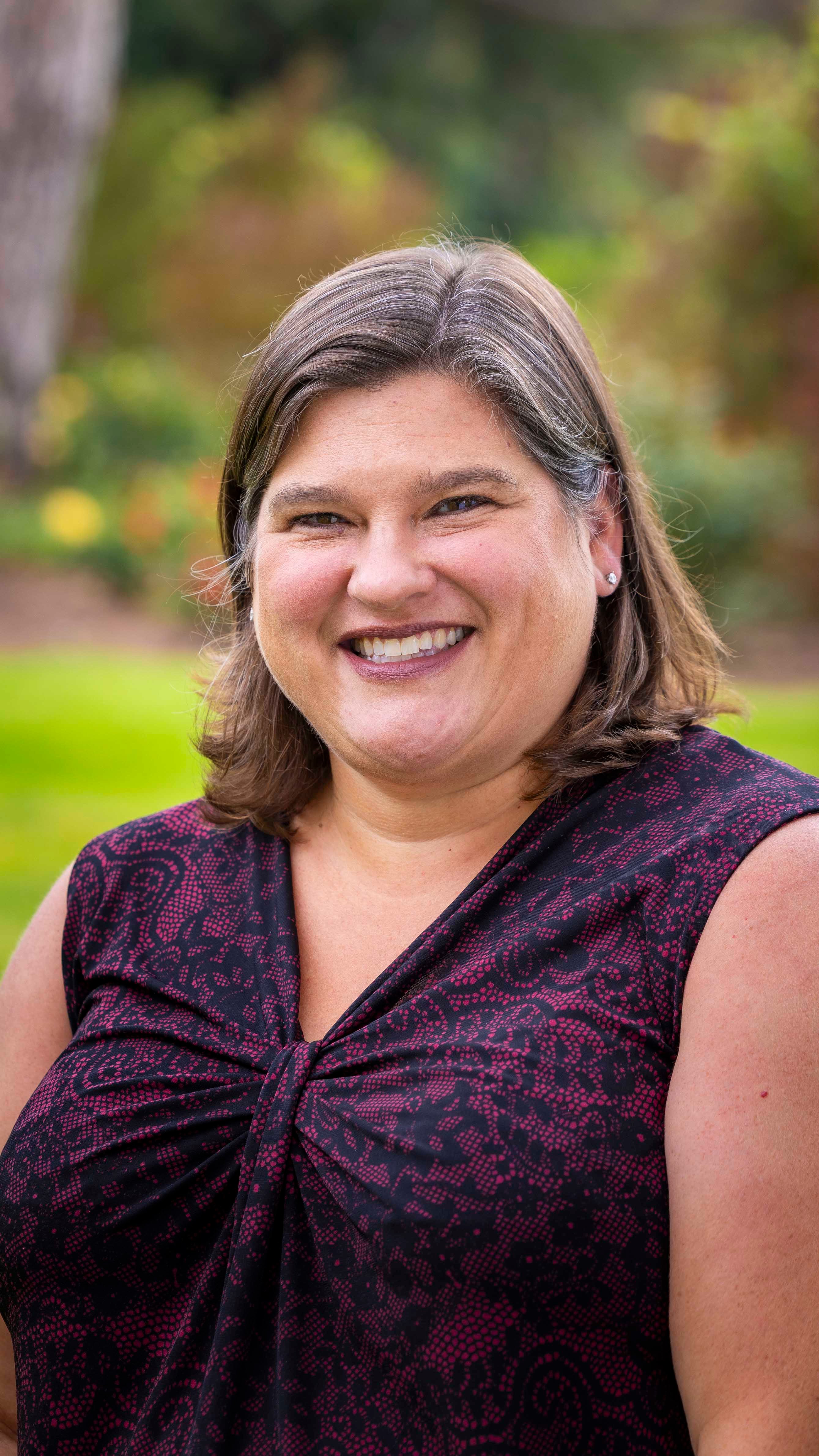 a person smiling at camera