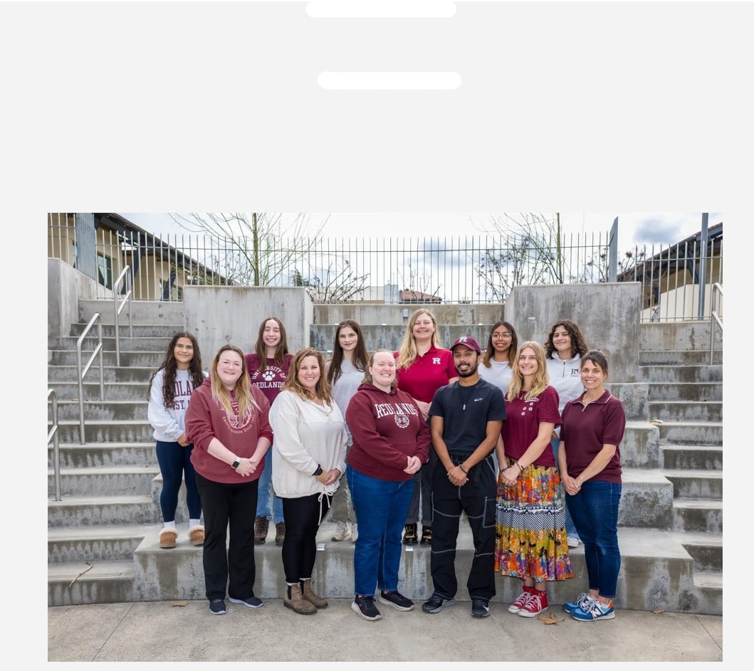 a group of people posing for a photo