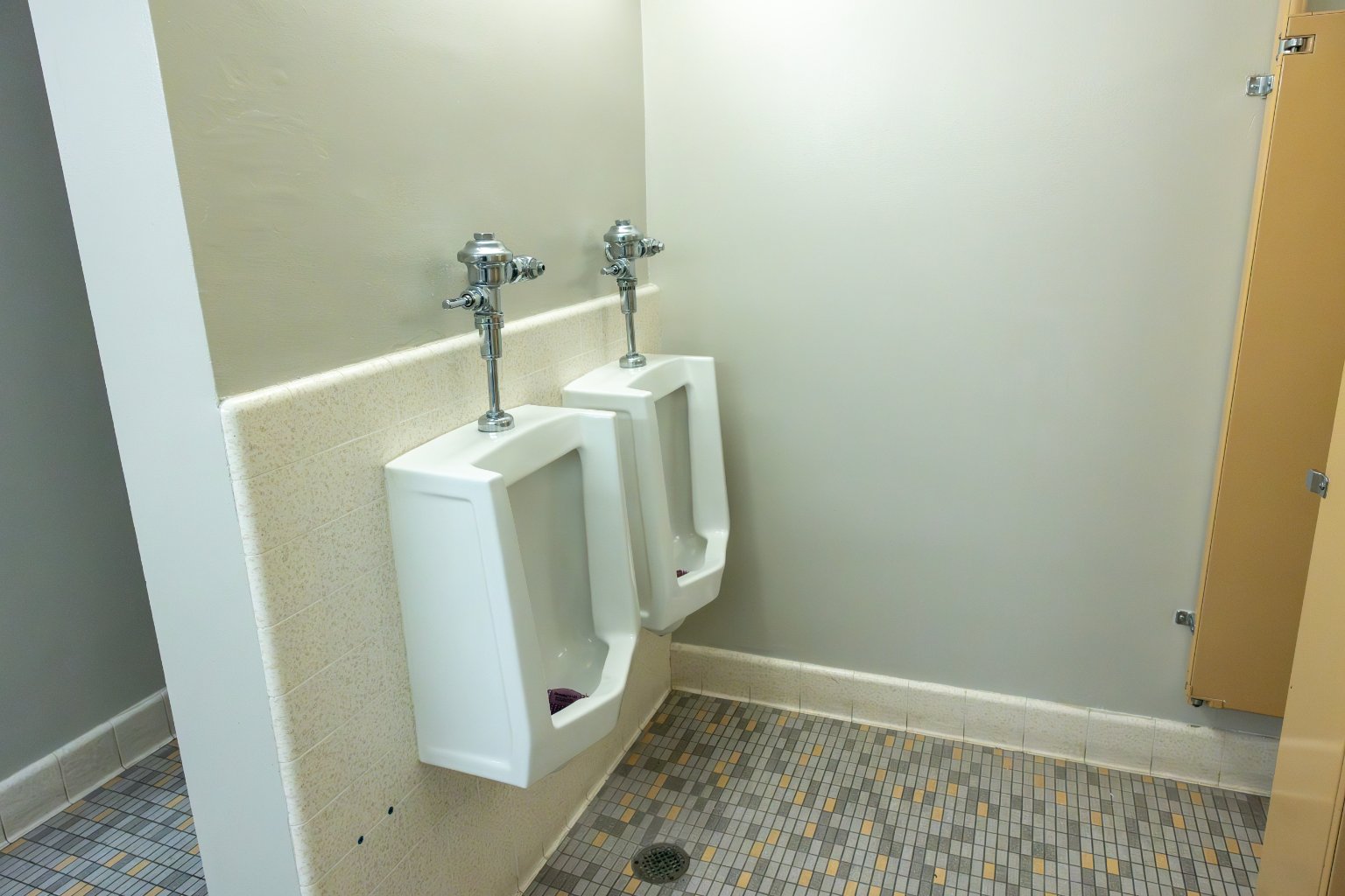a urinals in a bathroom