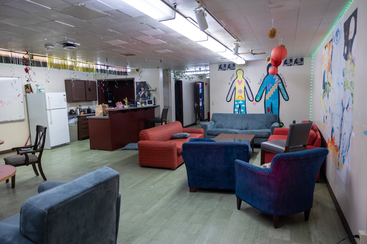 a room with couches and chairs