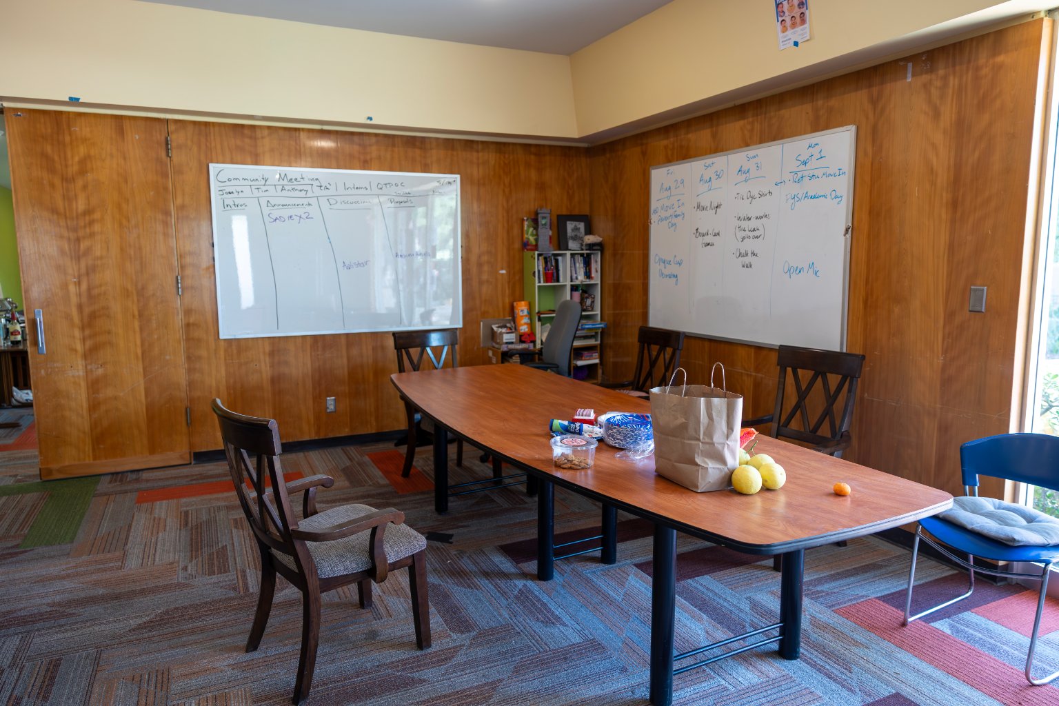 a room with a table and chairs