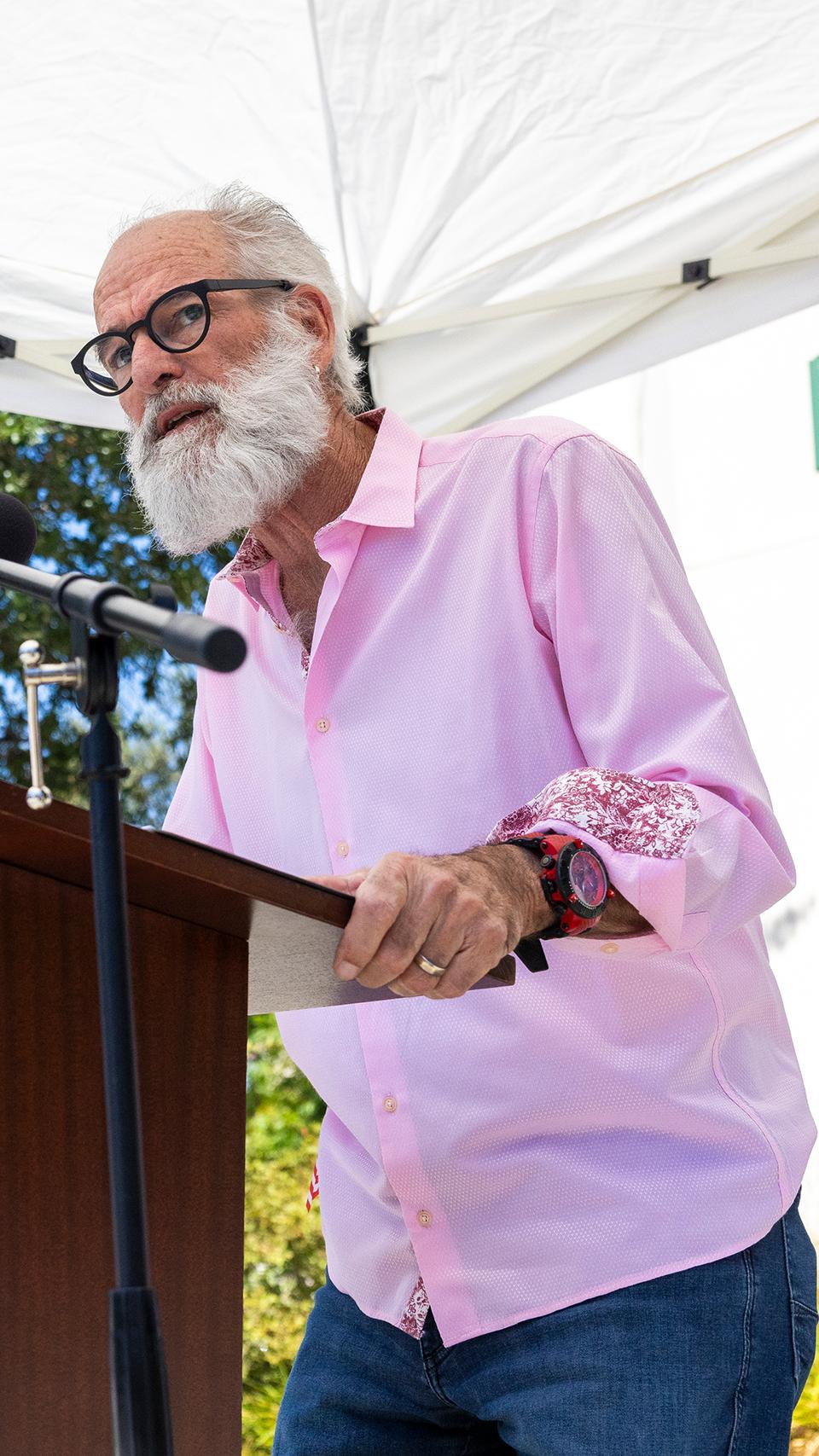 a man standing at a podium
