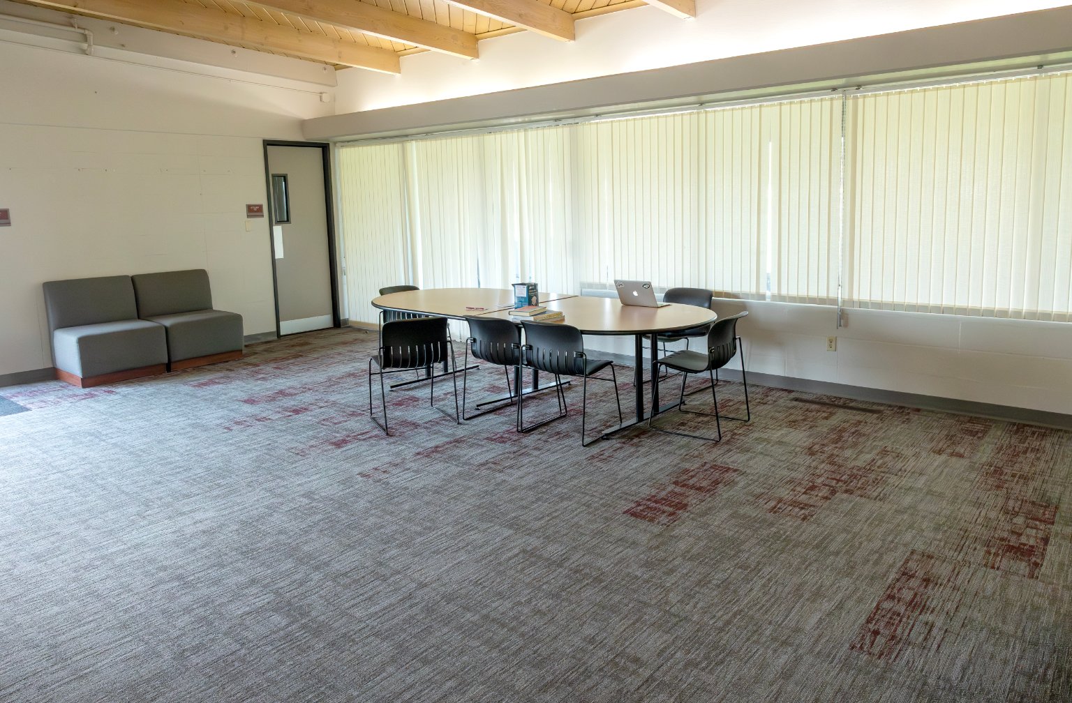 a room with a table and chairs