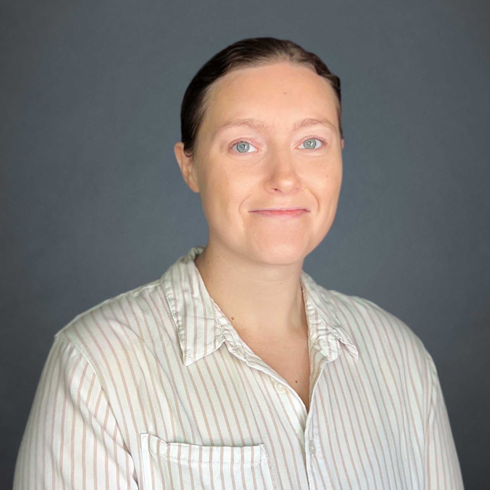 a person smiling for a picture