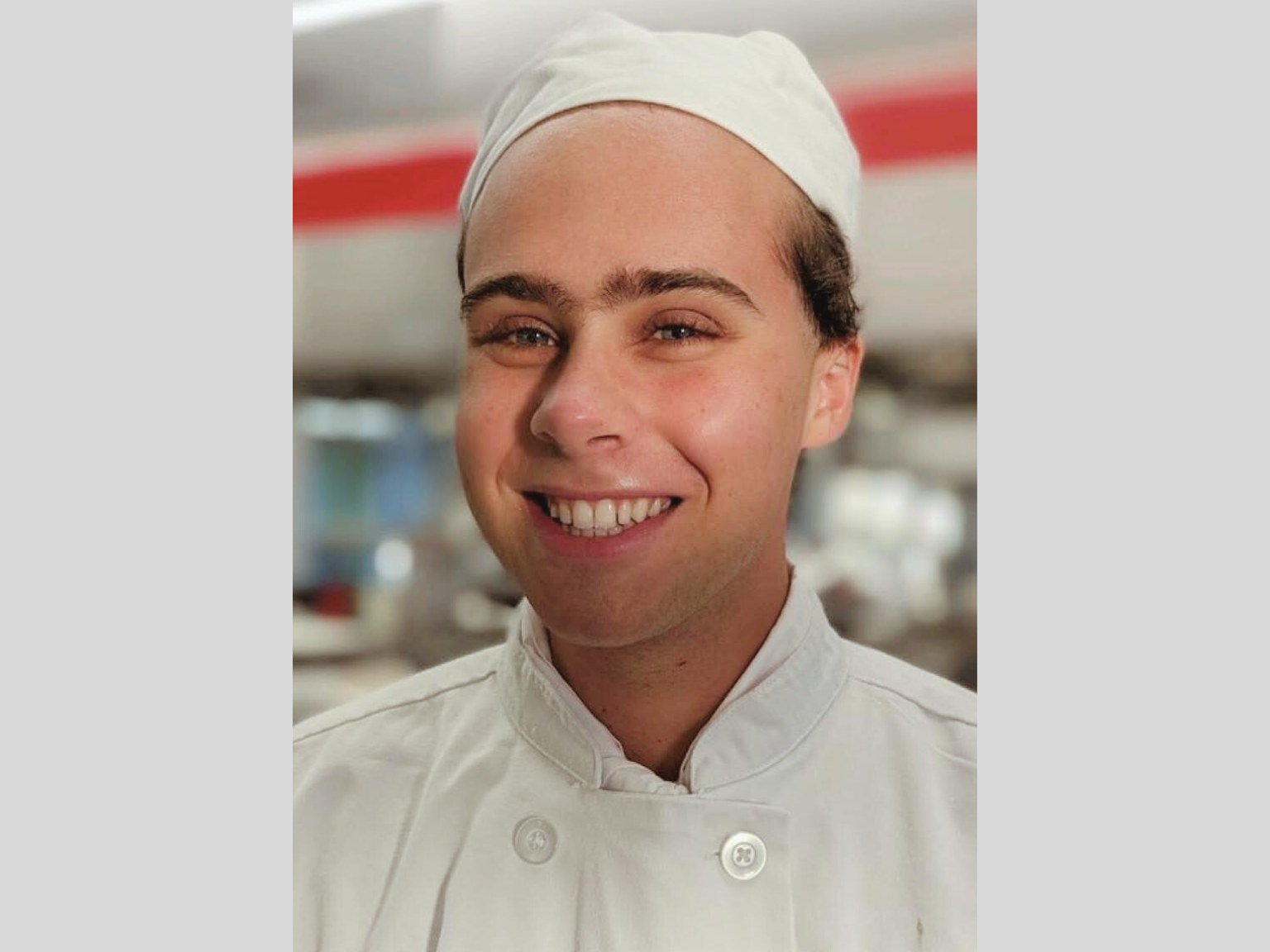 a person wearing a chef's hat