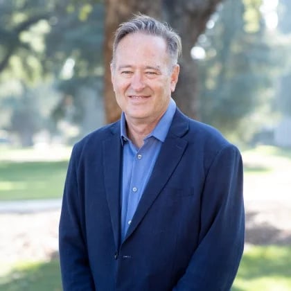 a man in a blue suit