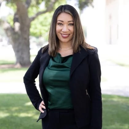 a woman in a black suit