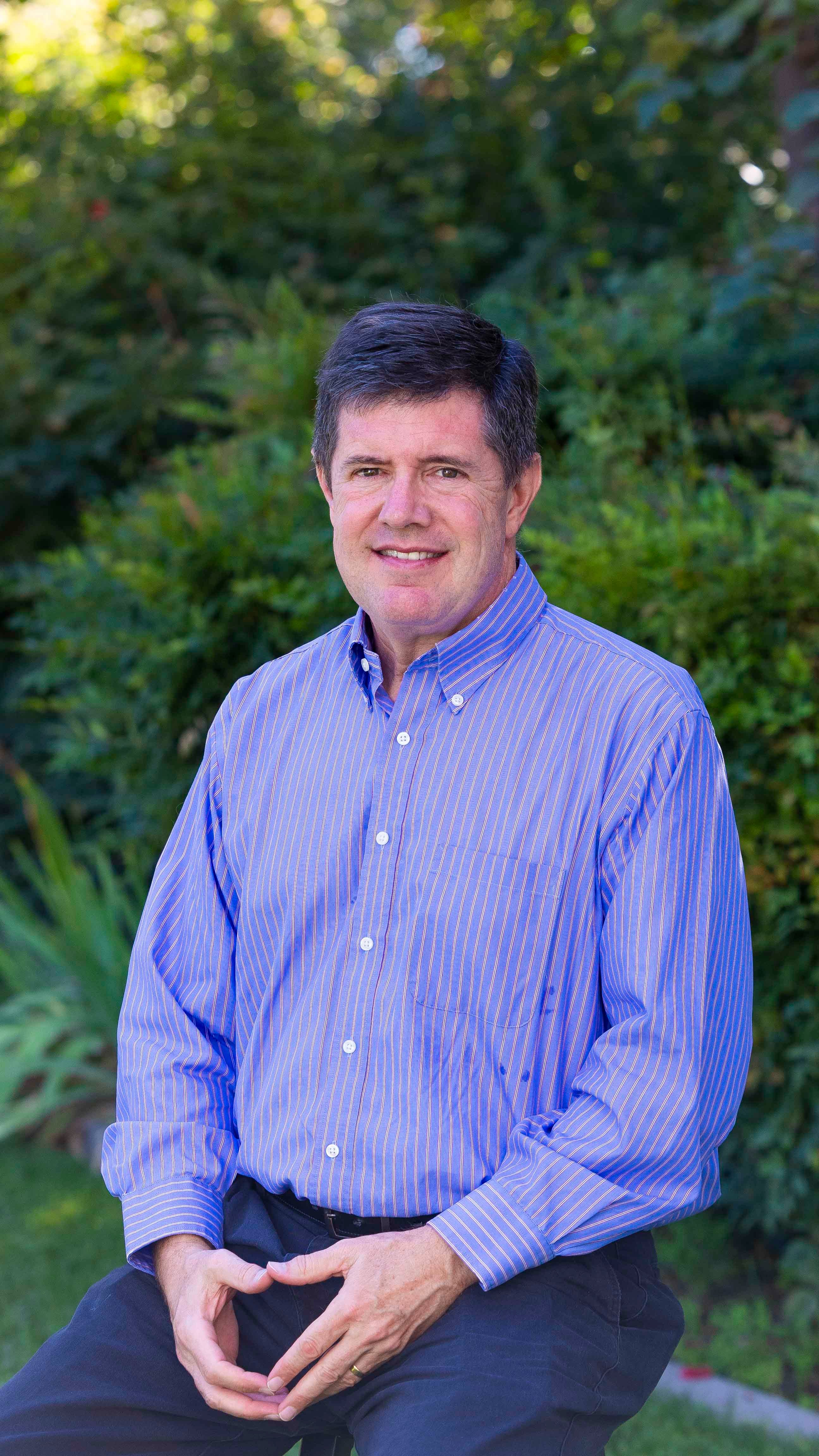 a man in a blue shirt