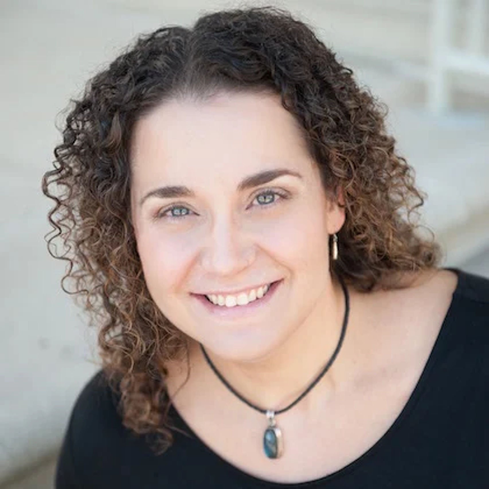 a person smiling at camera