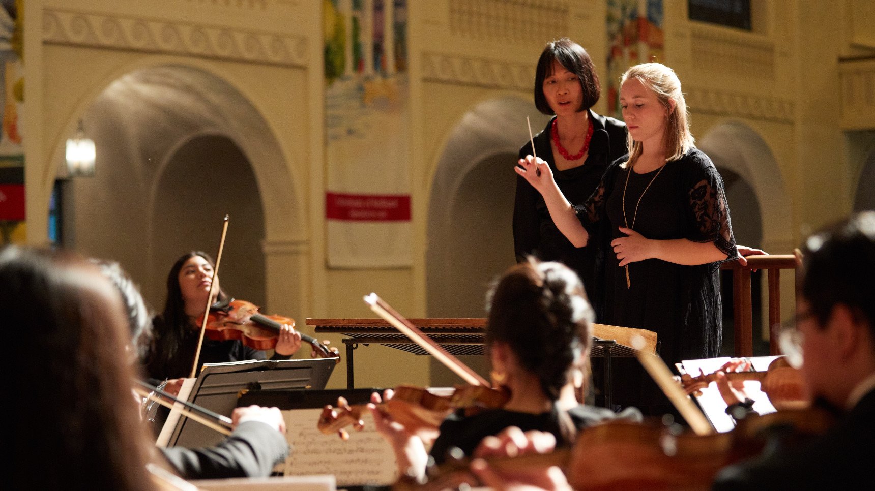 a group of people playing instruments