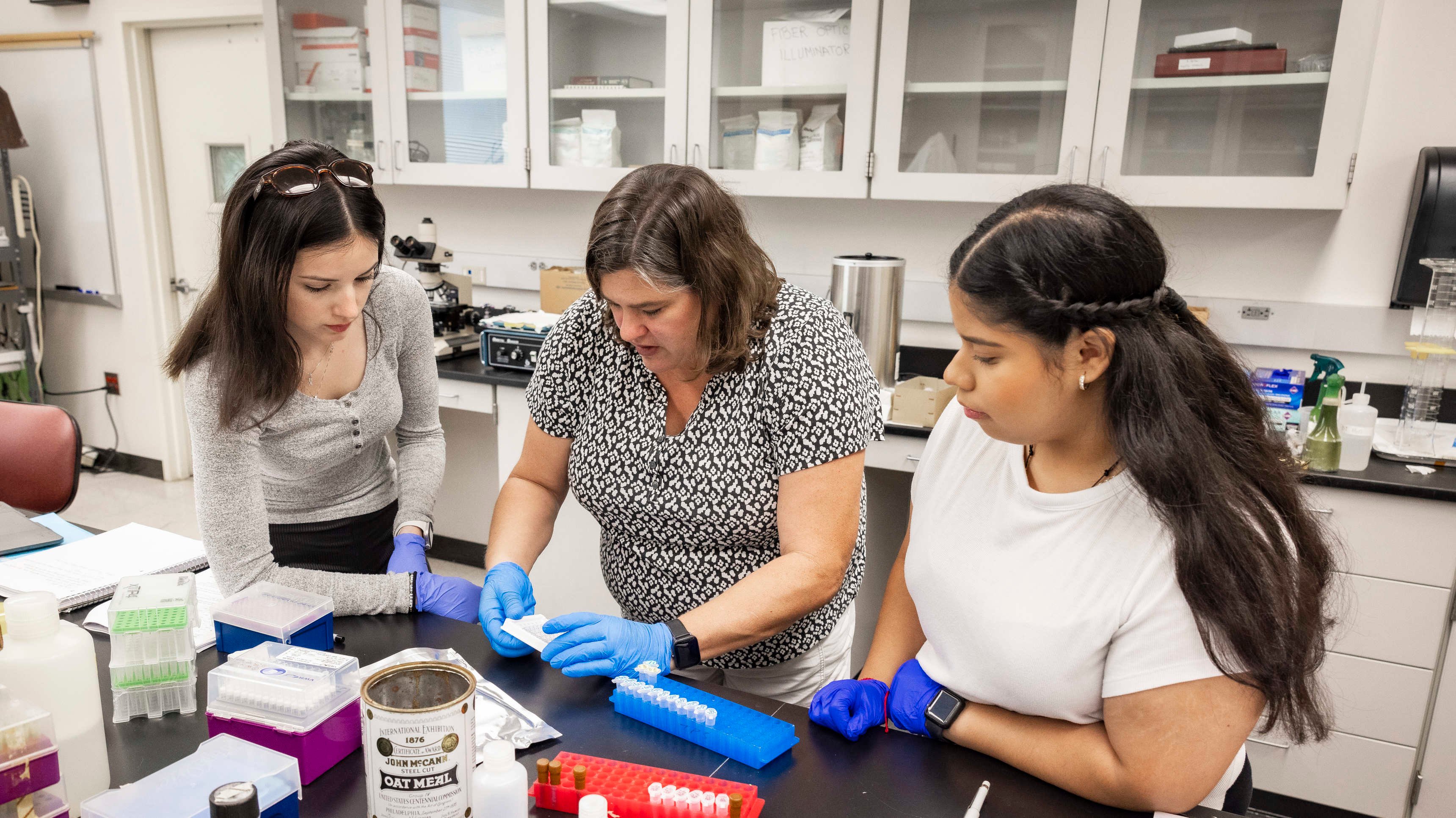 a group of women in a lab