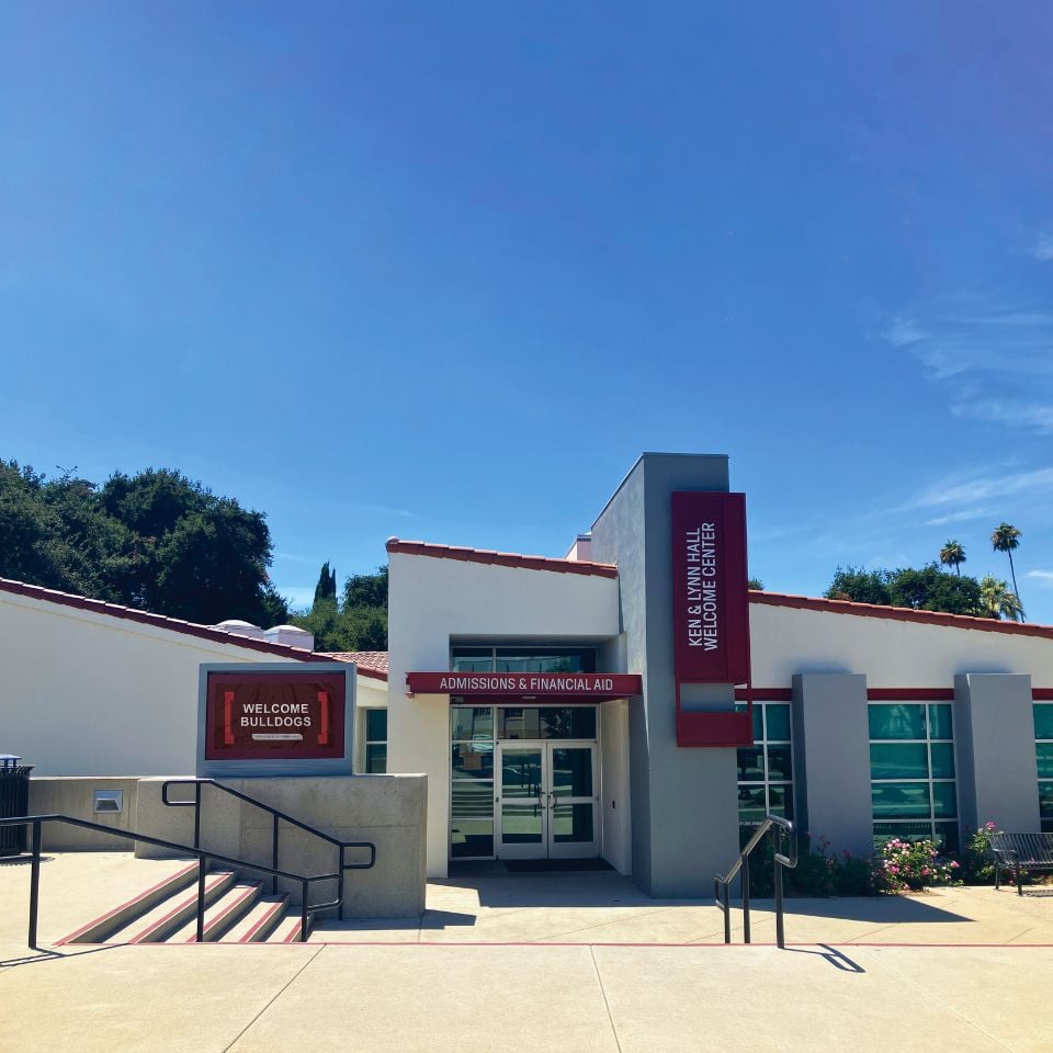 a building with stairs leading to the entrance