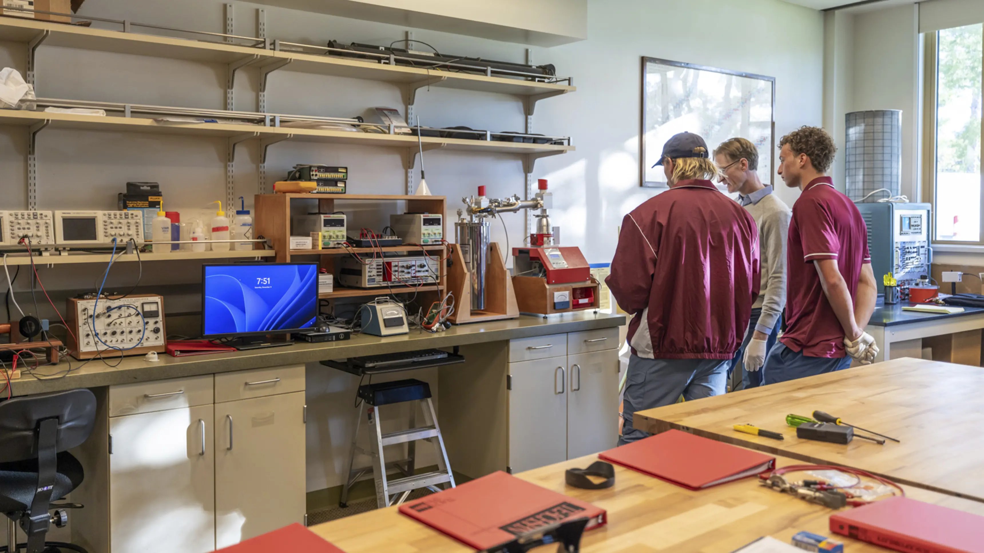 a group of men standing in a room