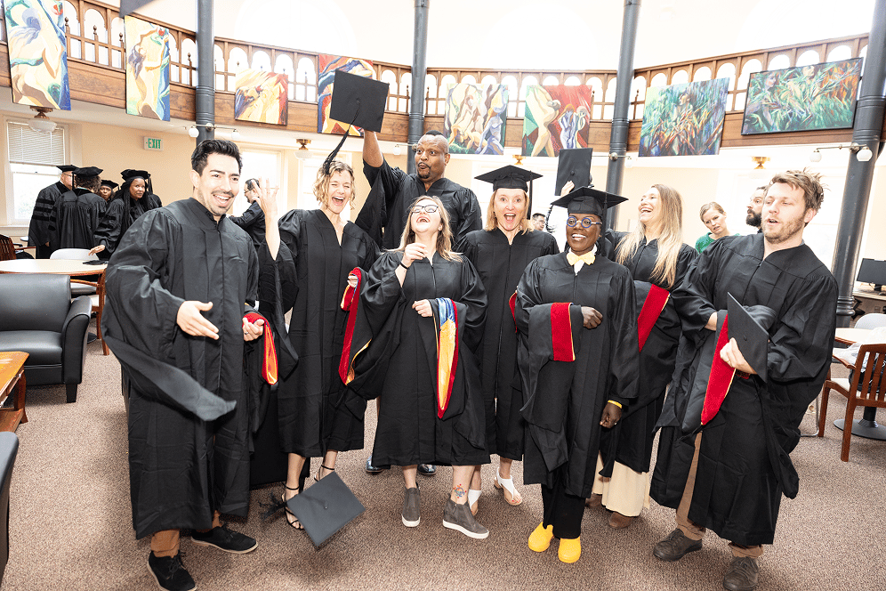a group of people in graduation gowns