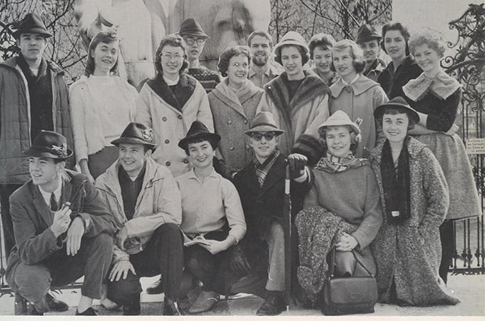 a group of people posing for a photo