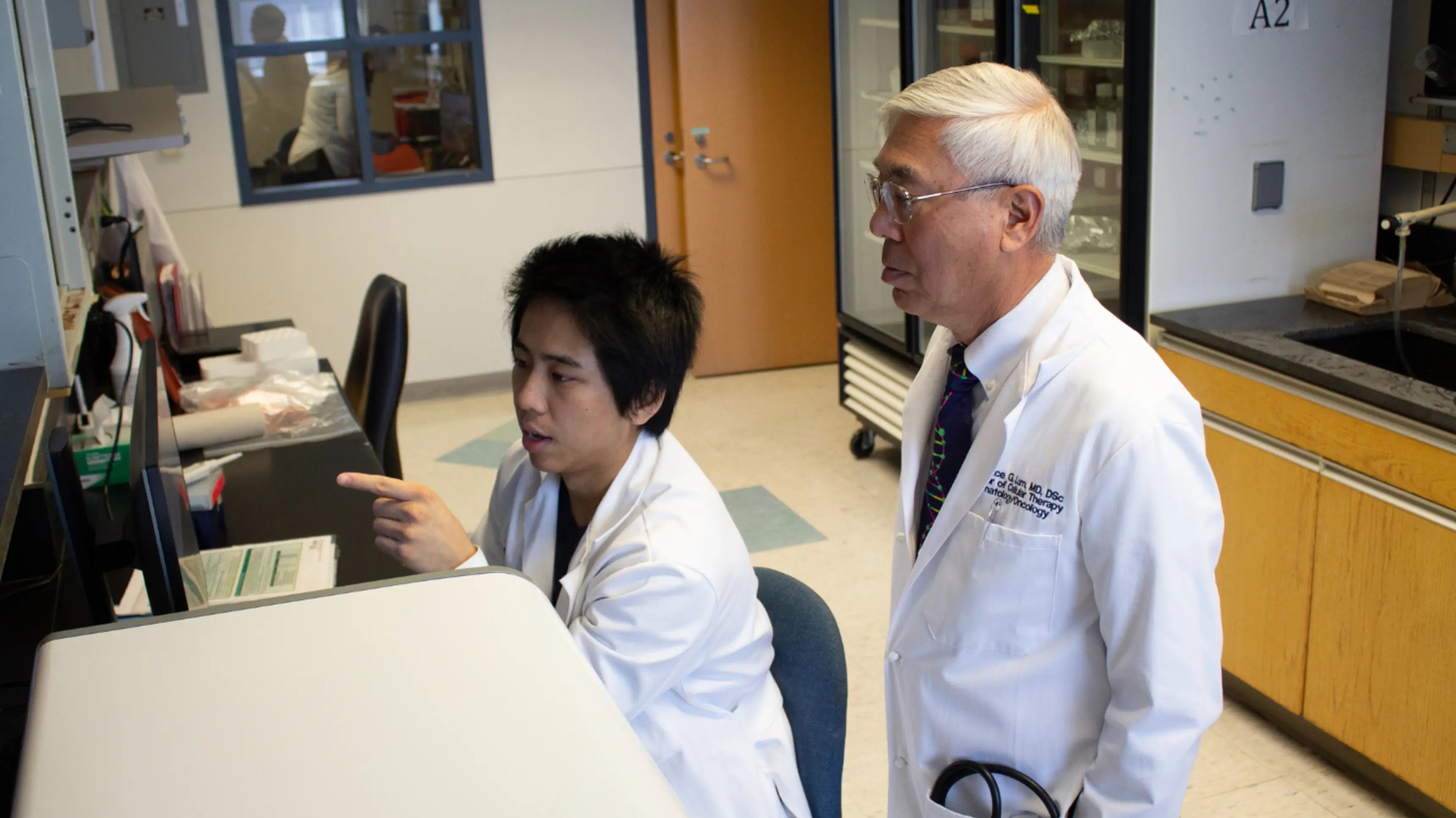 a person and person in lab coats