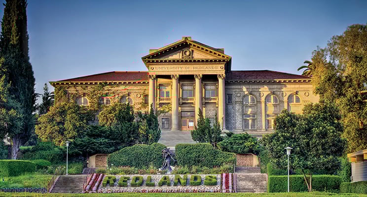 a building with columns and a sign