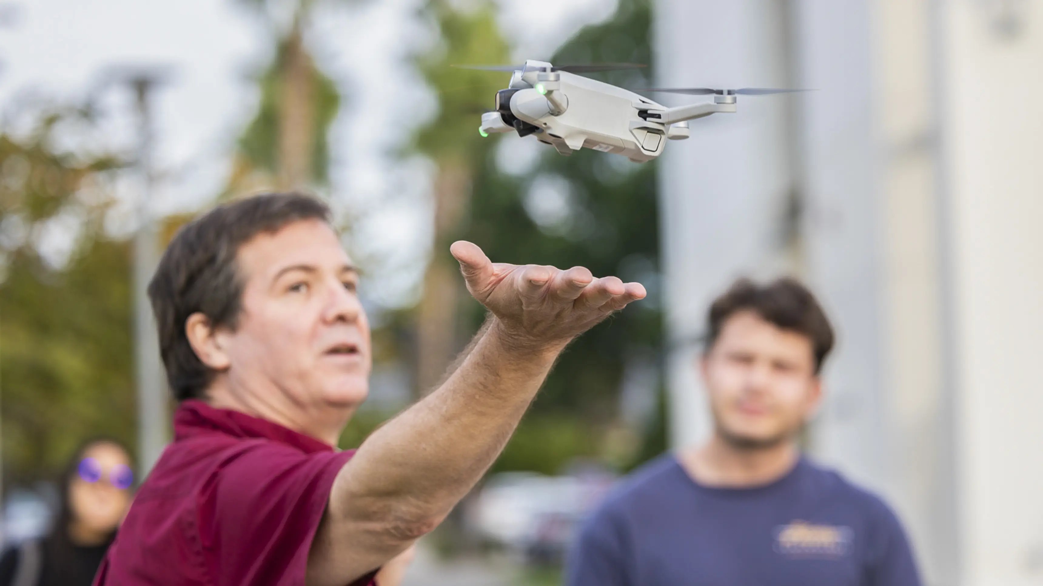 a person holding a drone