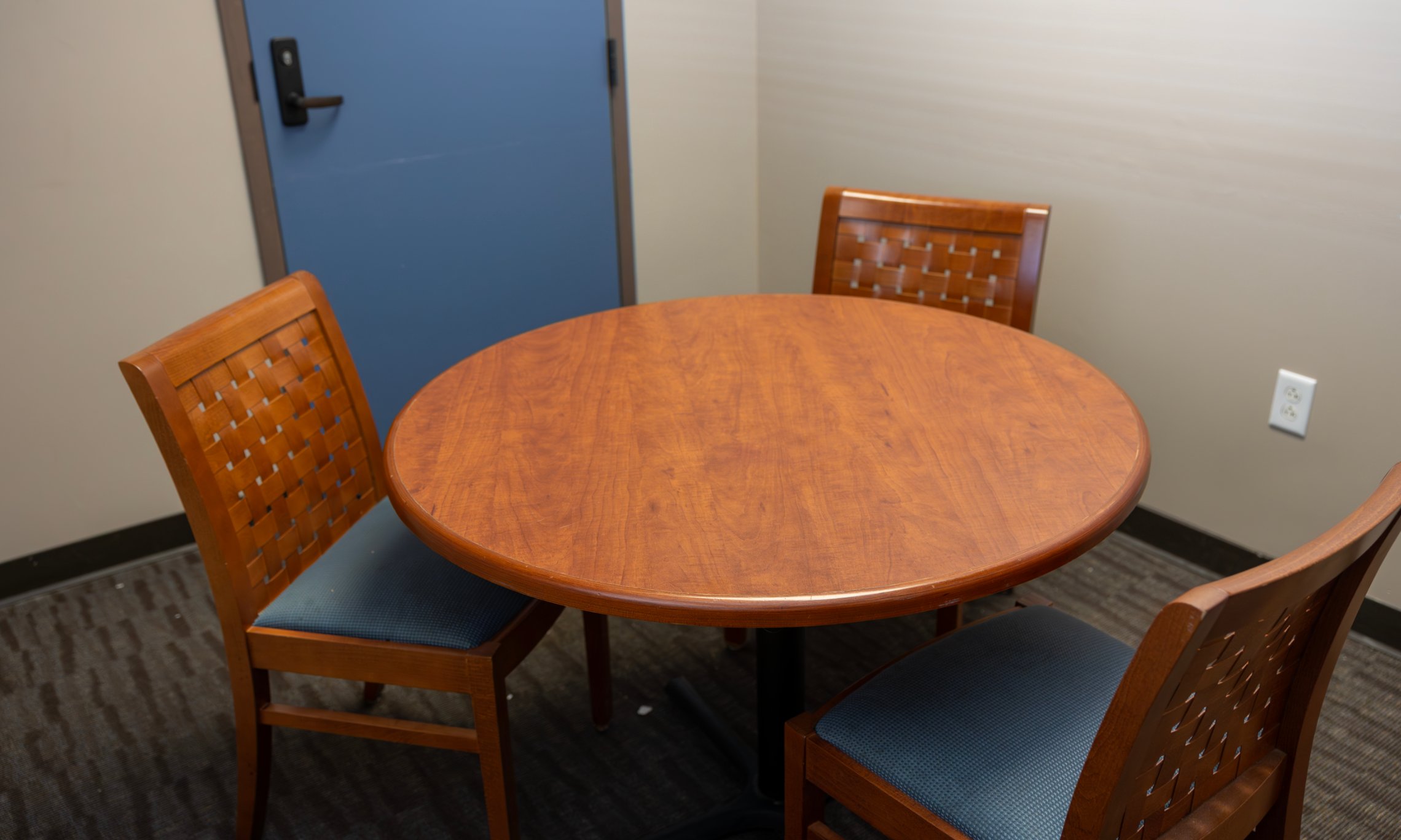 a table and chairs in a room