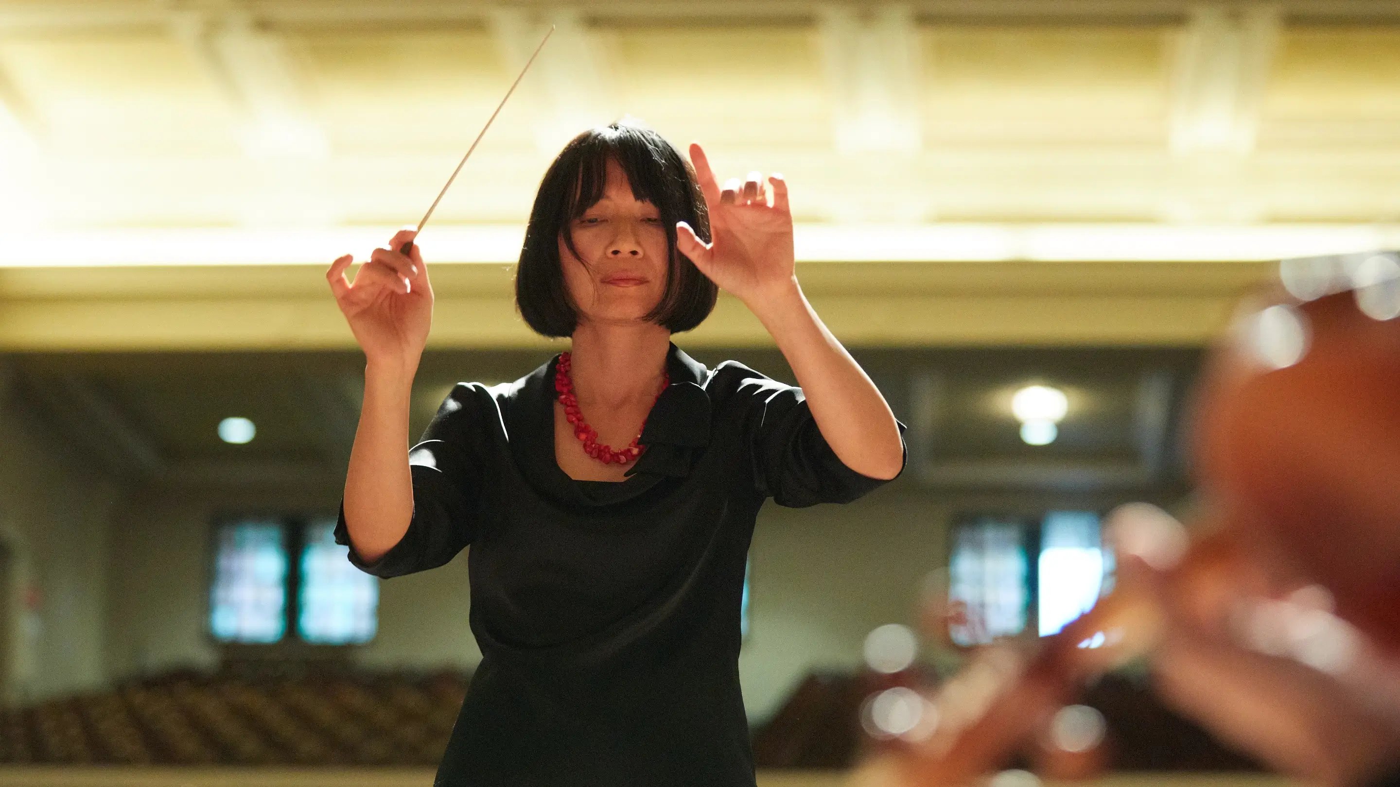 a person holding a stick