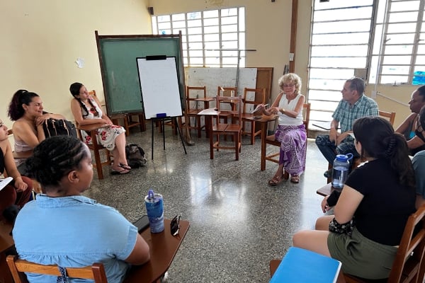 a group of people sitting in a room