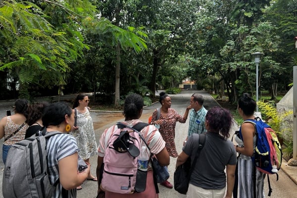 a group of people standing on a road