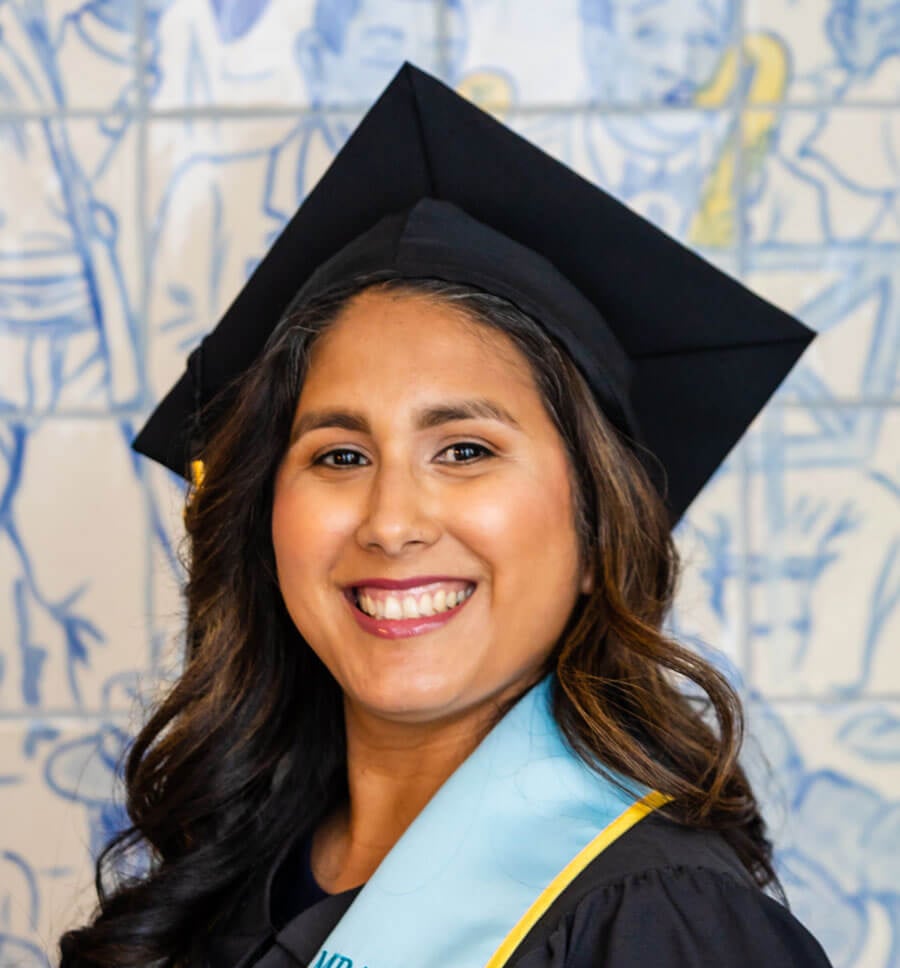 a woman in a graduation gown