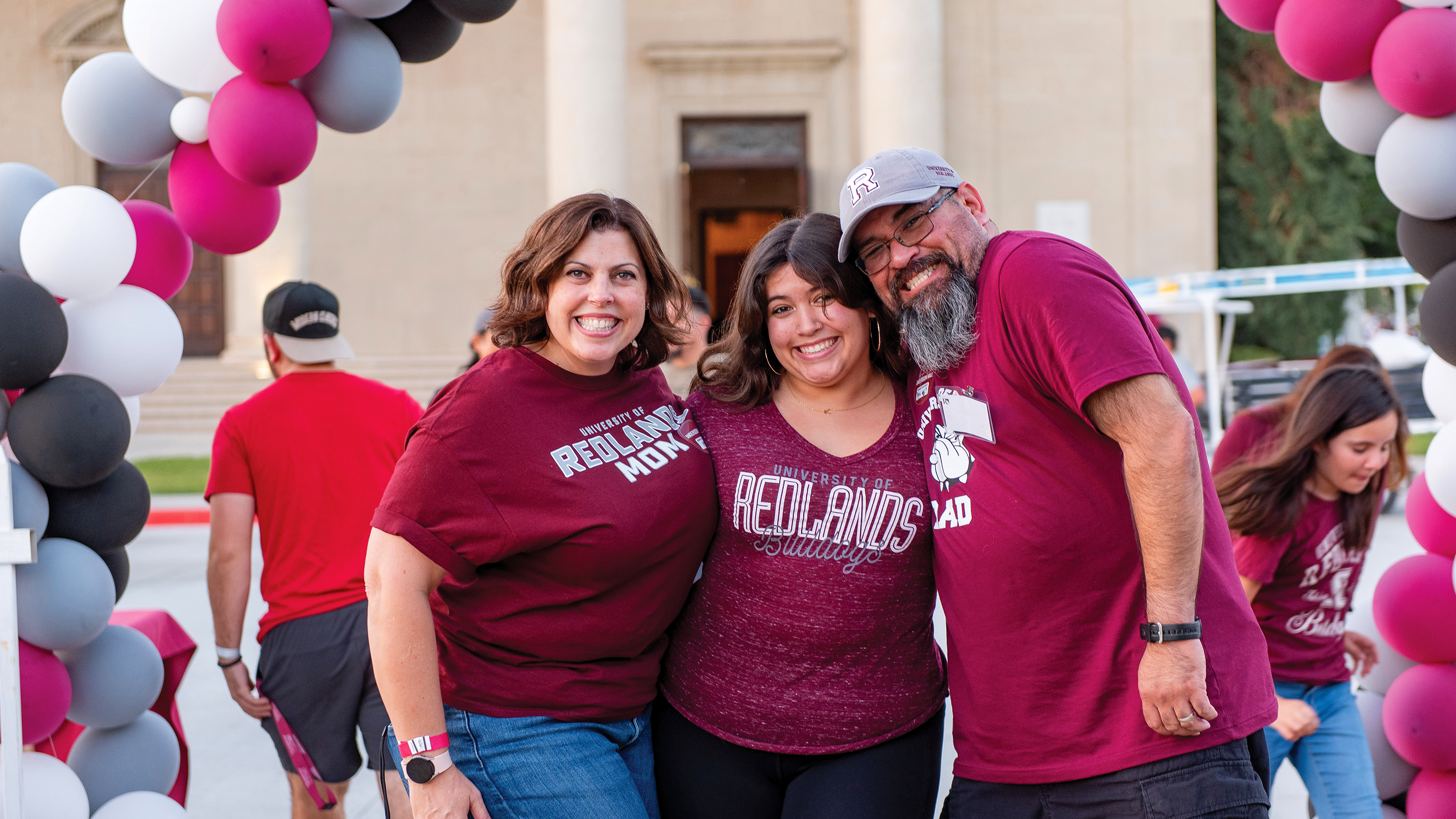 Media masthead - University of Redlands family at school event 1(2)