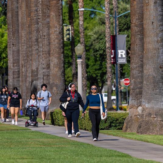 Image card - campus life students walking