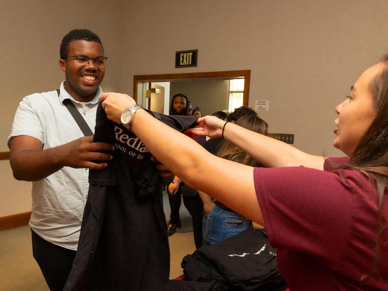 Image card - new student getting welcomed by admissions rep