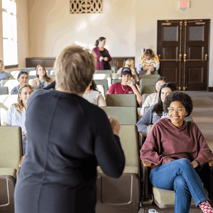 Media card - Professor teaching students