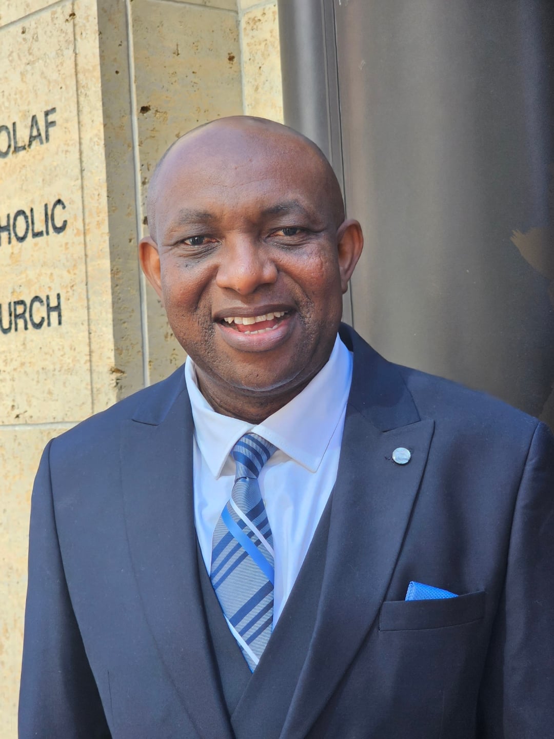 Michael E. Mbuluko